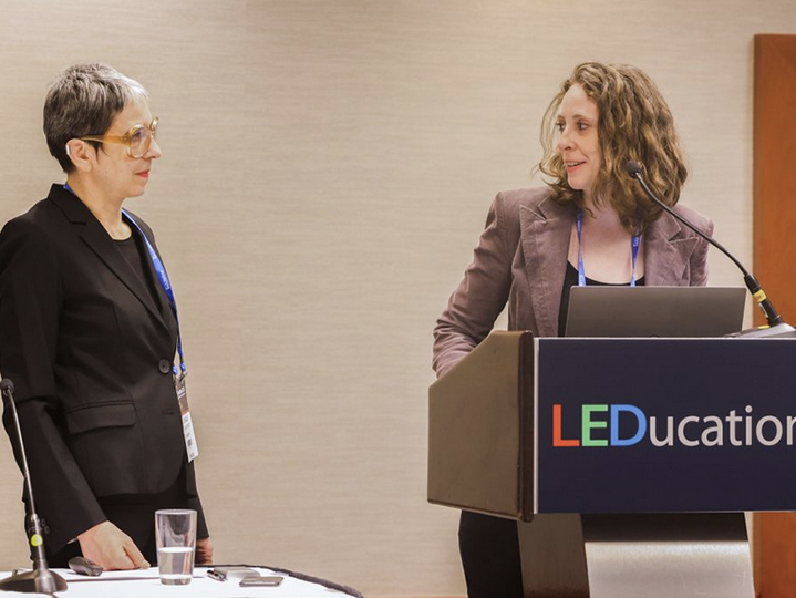 Nathalie and Jenny presenting Light Reach at the leducation podium